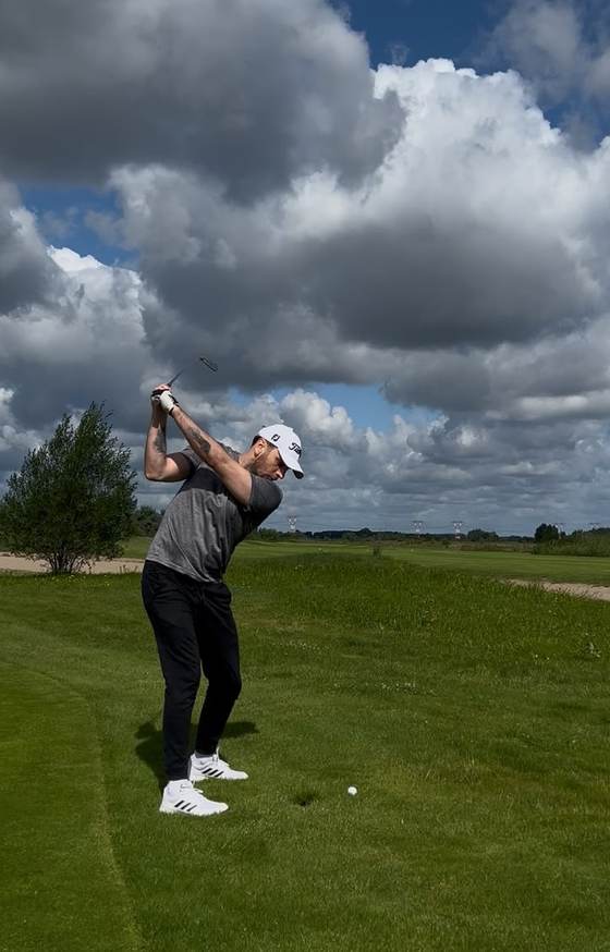 Pawel teeing off